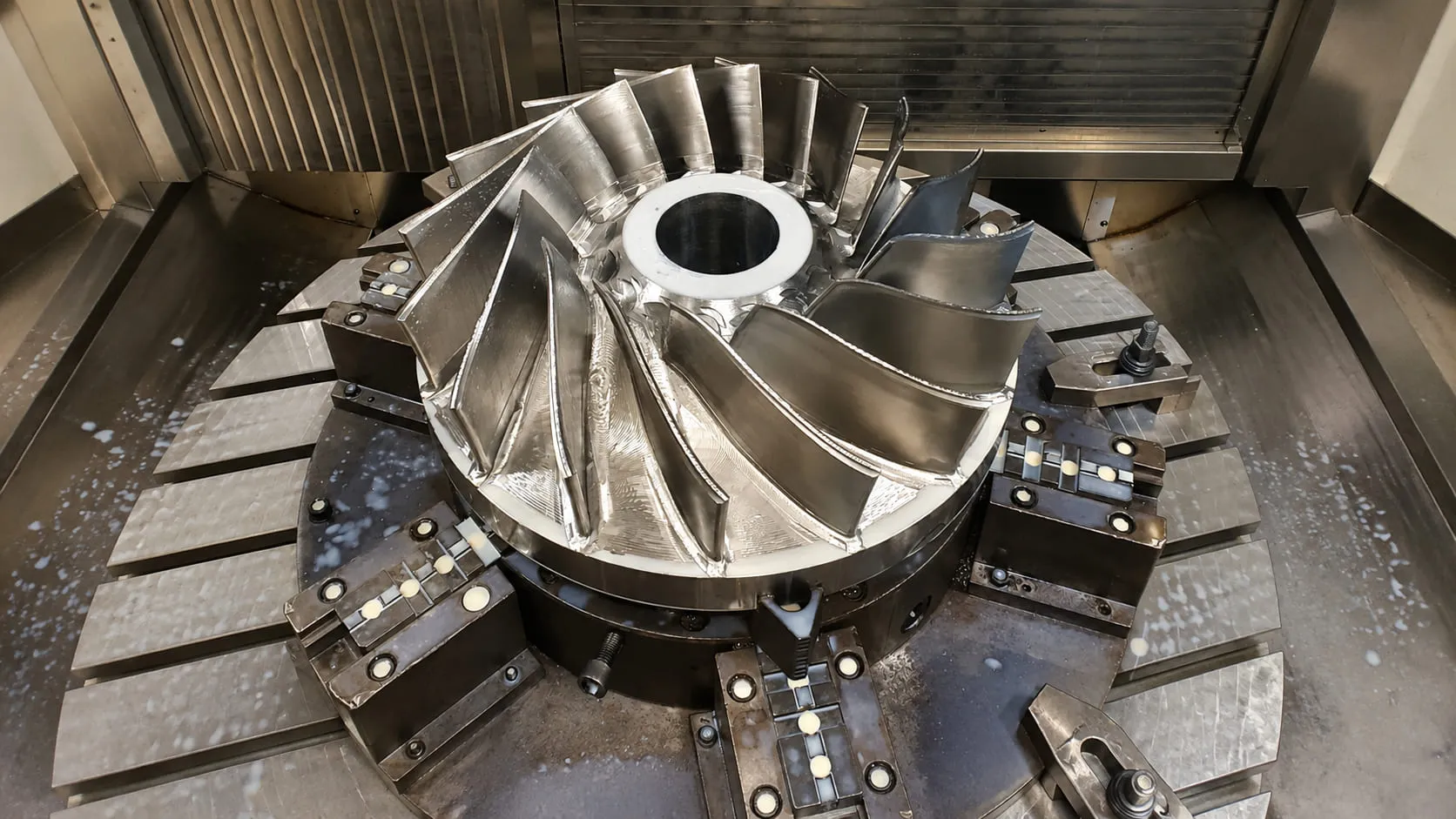 Welded and machined turbine runner assembly